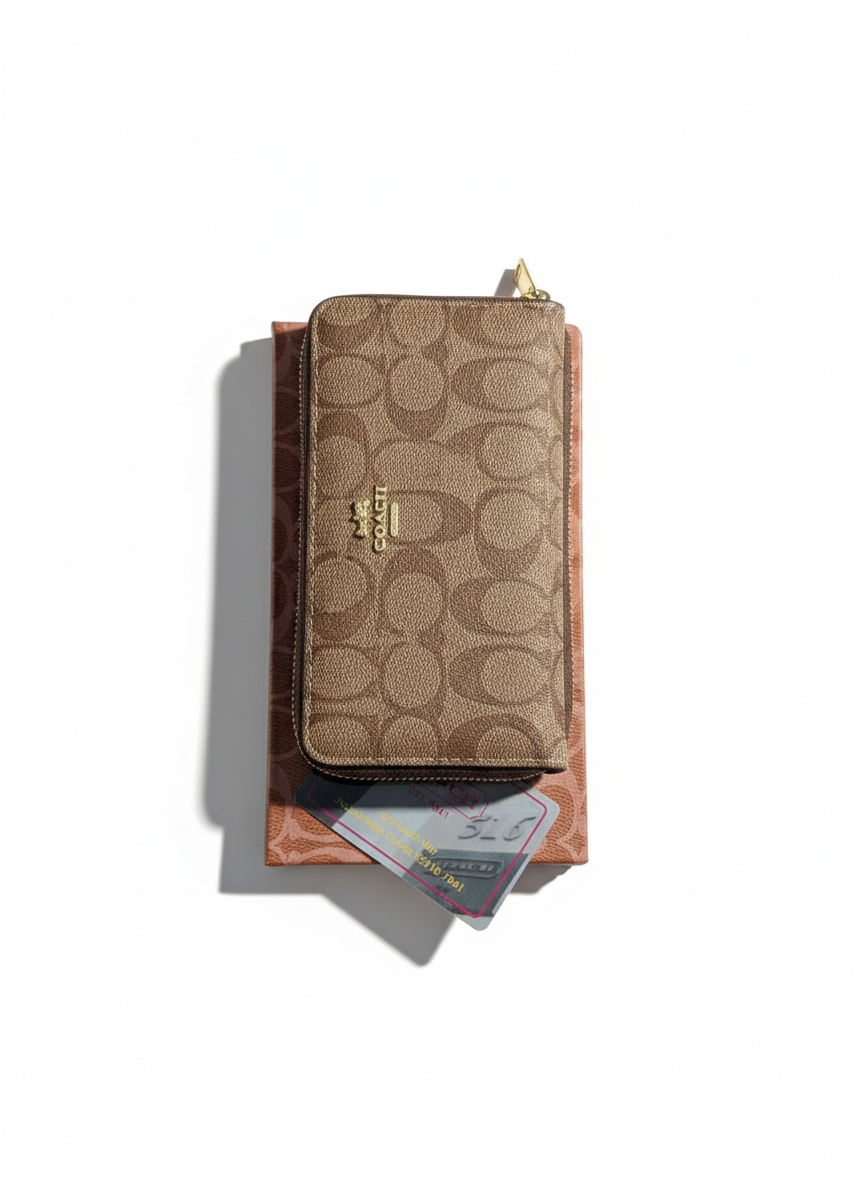 Coach Long Zip Around Wallet in Signature Canvas.