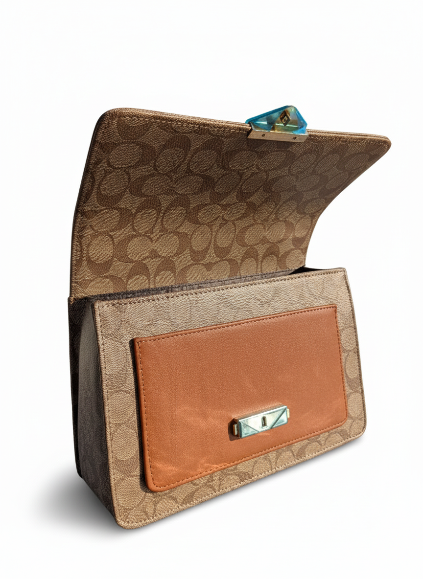 Coach Mila Crossbody Bag in Signature Canvas.